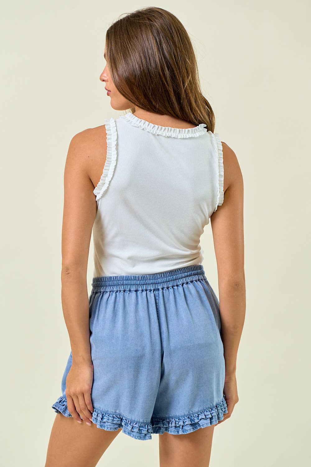 DENIM RUFFLE SHORTS W/ TIE BELT AND SMOCKING WAIST